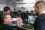 Peter Taylor mentors Wheeling High School students in their first-of-its-kind U.S. public high school nanotechnology lab.
