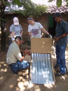 (From left-right) EOS Technology Manager Alvaro Rodriguez, Gleason, Stoll and local co-op president David Hernandez 