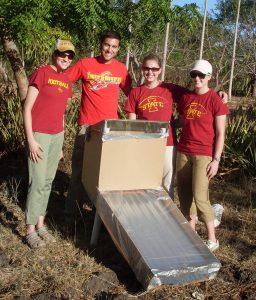 (From left-right) Alyse Herr, Greg McGrath (EOS Executive Director and trip leader), Nicole Stoll and Kristine Gleason with their solar fruit dehydrator