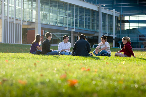 Engineering students talking on campus