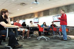 Clayton Anderson (right), ISU alumnus and astronaut, guest lectures aerospace freshman.