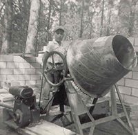 Netley mixes concrete at age 11 while helping build the Whitefish Lake, Minn., family cabin.