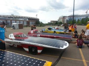 Several solar cars from around the world lined up on the finish line in Minnesota. Photo provided by Team PrISUm.