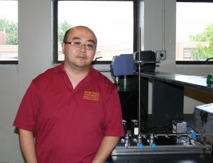 Yue Wu stands in his new research lab.