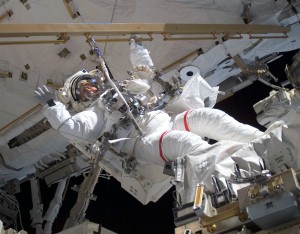 Clayton Anderson waves during a 2007 spacewalk at the International Space Station. Photo by NASA. 