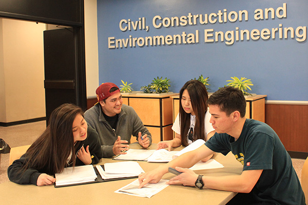 Guam-native students study in Town Engineering Building (from left): Grace Mercado, Tim Chargualaf, Rose Manual, and Toby Cruz.
