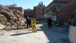 Iowa Task Force 1 looks for missing people in the Davidson Hall rubble.