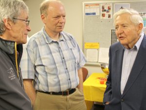Tom Wheelock (right) chats with CBE professors Chuck Glatz (left) and Kurt Hebert at his 90th birthday reception.