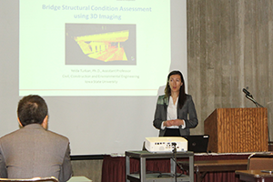 Yelda Turkan, assistant professor of civil, construction and environmental engineering, presents on bridge structural condition assessment using 3D imaging.