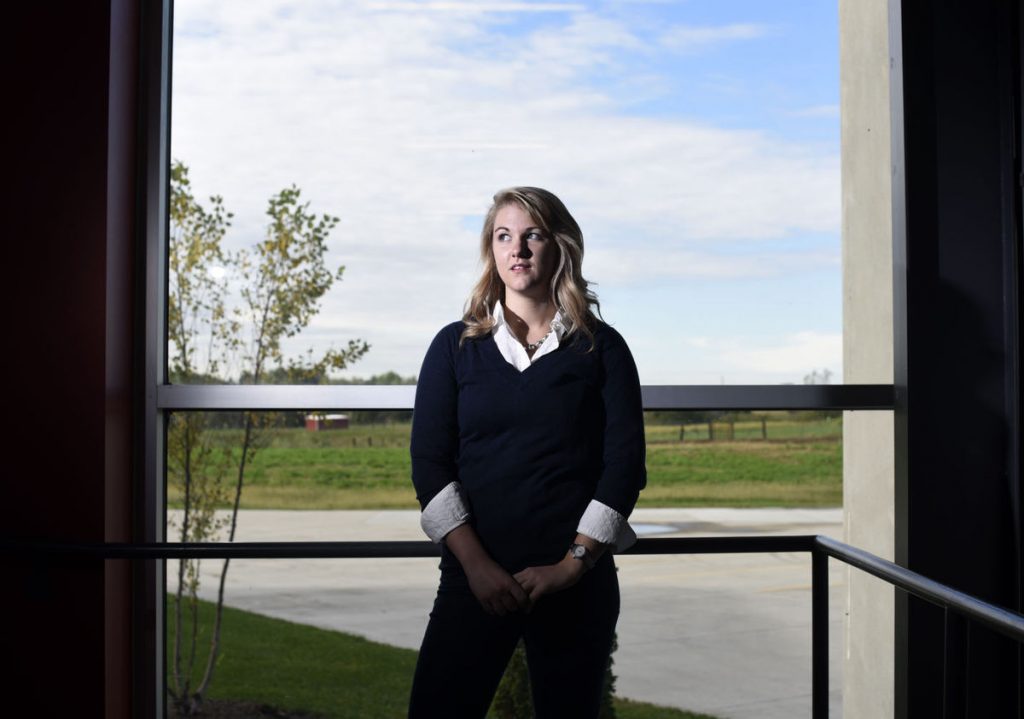 Jill Schoborg, senior in chemical engineering, poses for a portrait in the Hansen Agriculture Student Learning Center in Ames, Iowa. (Photo by Josh Newell)