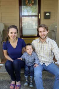 John Haughery with his wife and son.