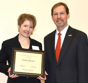 CBE academic advisor Tonia Baxter is shown with Iowa State University Senior Vice President and Provost Jonathan Wickert after receiving her CYtation Award.