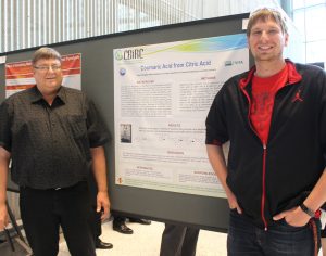 Darwin Daugaard (left) a high school science teacher from South Dakota and participant in this summer's RET program in CBE, is shown with his son Tannon, an ISU mechanical engineering graduate student.