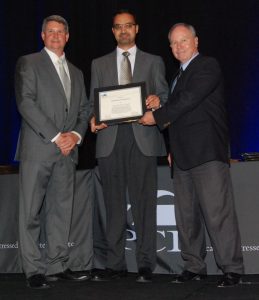 ISU alumnus Muhanned Suleiman (PhDCE2002, middle) accepts the George D. Nasser Award (Photo courtesy PCI)