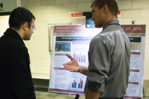 Ophoff (right) gives research presentation (By Kate Tindall)