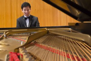 Hu plays a movement of Beethoven's Sonata No. 11 in B Flat Major (Photo by Kate Tindall)