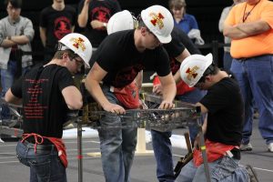 Members of ISU ASCE Steel Bridge construct bridge pieces during competition (Courtesy Joni Truong)