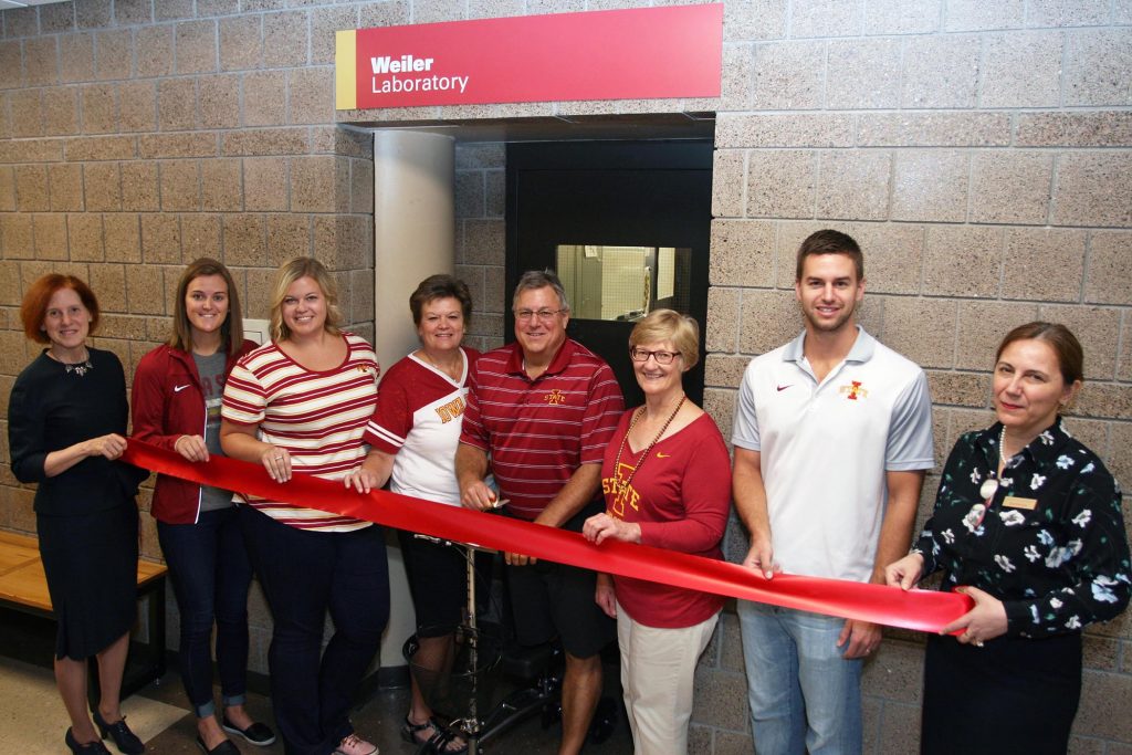 The Weiler family and Iowa State College of Engineering faculty during the ribbon-cutting for the Weiler Laboratory