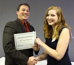 Prof. Tom Mansell with award