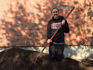 Carissa Moyna <i> (pictured) </i> has enjoyed digging into compost projects since her high school days. 