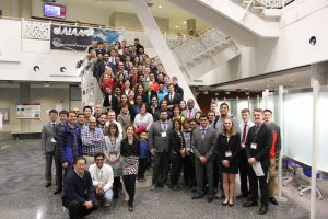 Graduate students, undergraduate students and judges gather for a group photo following awards at the research showcase. <i> Photo by Kate Tindall.</i>