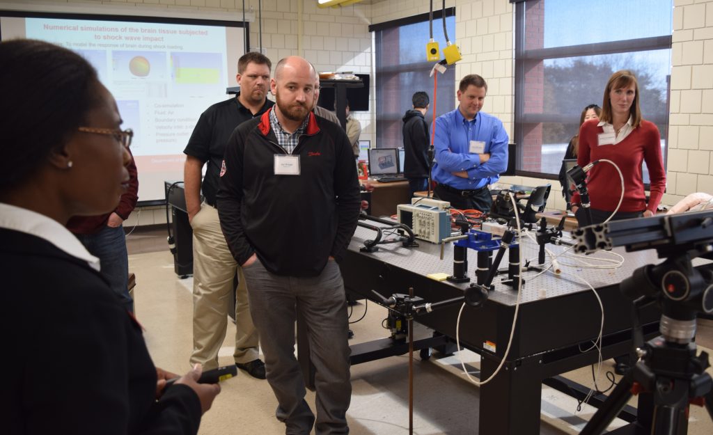 ME assistant professor Sarah Bentil shows off equipment in her lab to the ME Industry Advisory Council during their fall 2017 meeting