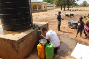 Matt Schweitzer, a student member of EWB, carries out water quality tests.