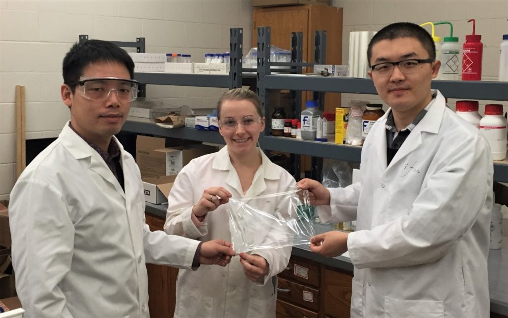 Professor Shan Jiang is pictured with MSE graduate students, Emily Olson and Yifan Li.