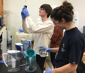 A group of freshman conduct research during a final session of FRI. <i> Photos by Tindall.</i>