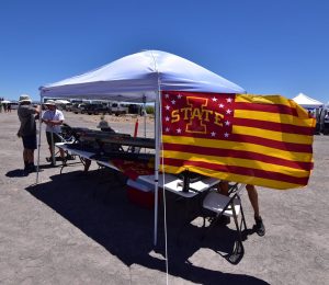 Iowa State flag next to club canopy