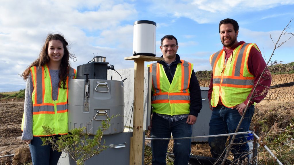 (From left) Schussler, co-principal investigator/ISU CCEE Assistant Professor Bora Cetin and Perez at a research site in Tama County, Iowa. <i>Photo courtesy Schussler.</i>