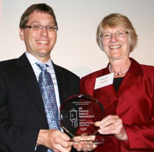 Determan receiving award from Dean Rajala 2015
