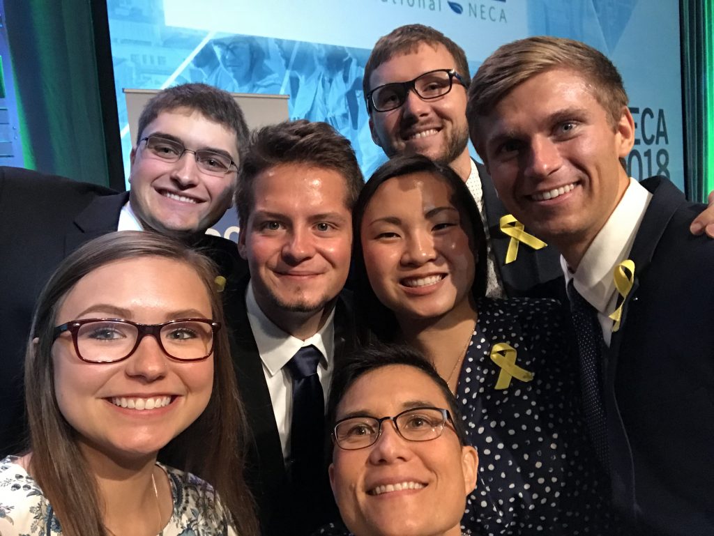 Team members from Cyclone Energy celebrate their win. The team wore yellow ribbons in remembrance of ISU CCEE student-athlete Celia Barquin Arozamena. <i> Photo courtesy Beth Hartmann.</i>