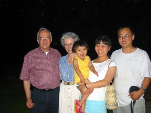 Joan and Dr. Weber with Jie Long's family in Boone in 2003