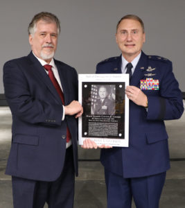 Vance and Arlene Coffman Endowed Department ChairAlric Rothmayer presents plaque to Maj. Gen. Crosier