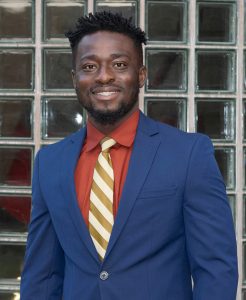 ME graduate student Emmanuel Tetteh poses outside of Black Engineering Building