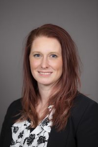 Headshot photo of Andrea Mauton smiling