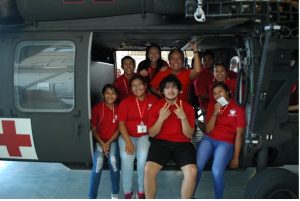 Cornelius and high school kids inside a helicopter