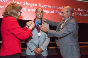 ISU President Wendy Wintersteen and College of Engineering Dean Sam Easterling present madallion to Cochran