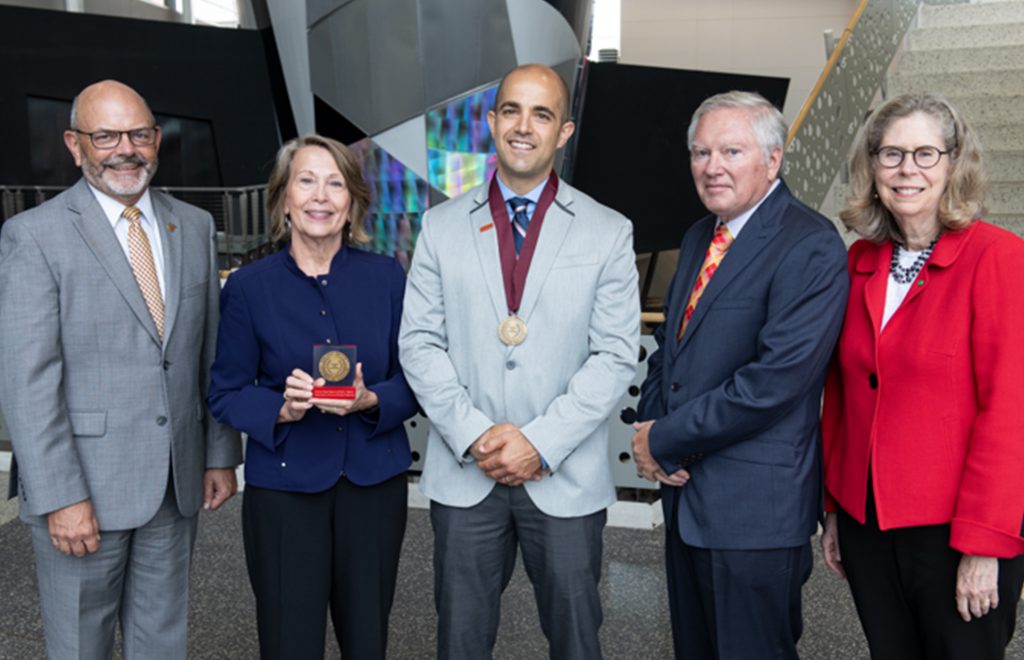 CBE's Eric Cochran (center) is joined by (left to right): and James L. and Katherine S. Melsa Dean of Engineering Samuel Easterling, Mary Jane Skogen Hagenson, Randy Hagenson and ISU president Wendy Wintersteen