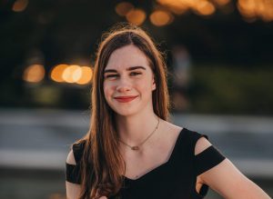 Headshot of Darcy Bonds outside