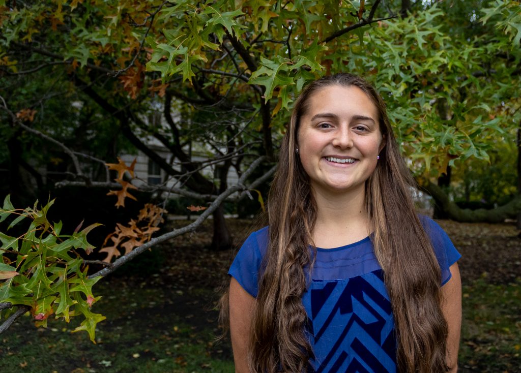 Iowa State senior Nicole Martindale smiles for a photo outside of Marston Hall.