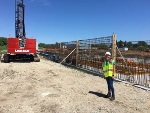 Iowa State senior Nicole Martindale stands at a work site.