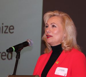 Lori Ryerkerk speaks following her Hall of Fame induction