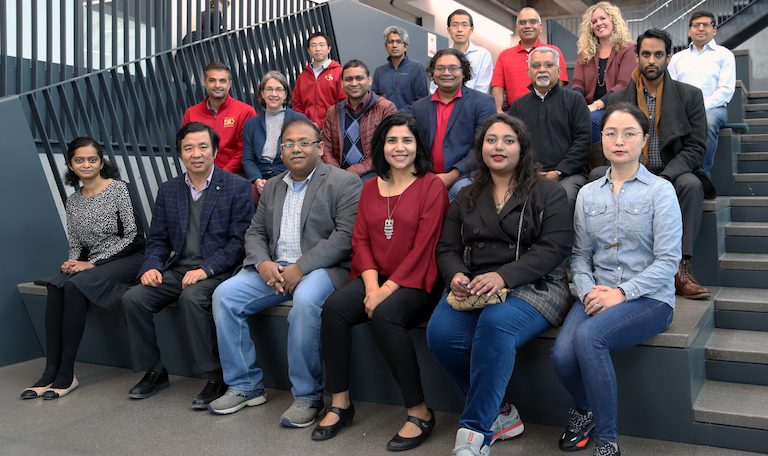 Group photo of team members who are part of ISU's new AI center, all seated