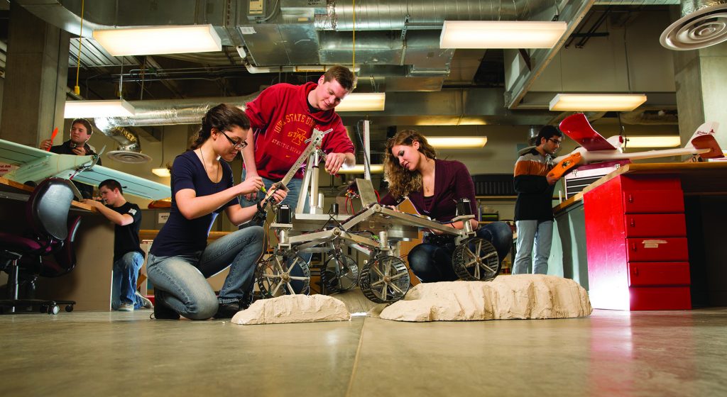 Students collaborate on a space rover in the M:2:I lab