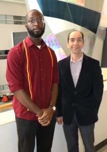 Teaching Excellence Award recipient Chukwudum Eluchie with adjunct assistant professor Shahram Pouya