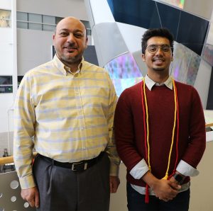 Research Excellence Award recipient Madhusudan Vijayakumar (right) with nominator Ossama Abdelkhalik