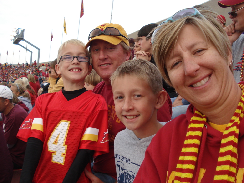 The Stoufer family smiles for a photo while attending an Iowa State Cyclones football games in the 2000s.