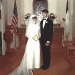 Pam and Larry pose for their wedding photo at a church in 1970.